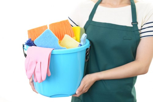 Carpet cleaning team preparing equipment safely before work